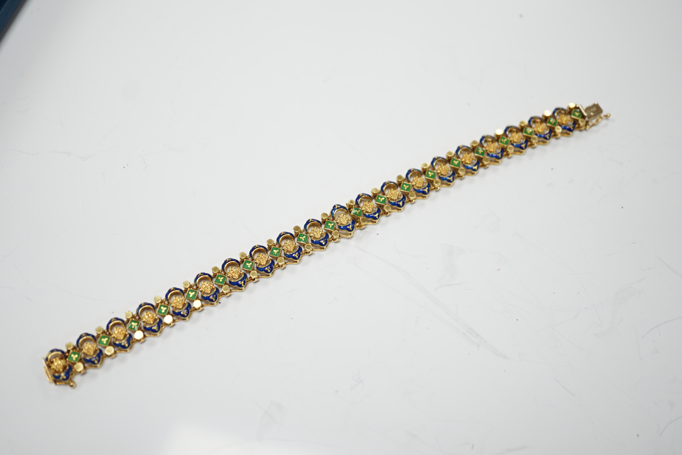 A 20th century Italian Uno-A-Erre 750 and two colour enamel set bracelet, 19cm, gross weight 33.4 grams.
